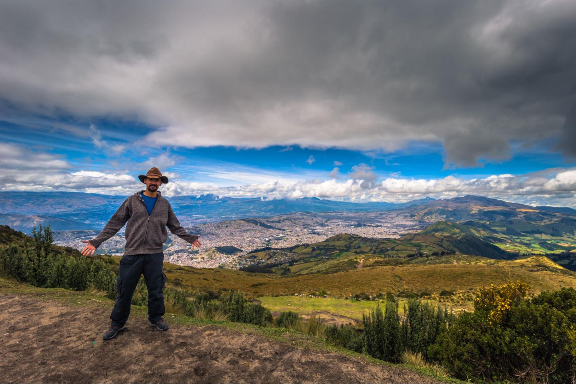 Tourist overlooking the city of Quito, Ecuador 